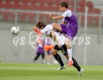 Fussball OEFB Cup. SK Austria Klagenfurt gegen Parndorf. Marko Rojc, (Austria Klagenfurt), Sebastian Wimmer (Parndorf). Klagenfurt, 24.9.2013.
Foto: Kuess
---
pressefotos, pressefotografie, kuess, qs, qspictures, sport, bild, bilder, bilddatenbank