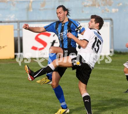 Fussball Kaerntner Liga. Bleiburg gegen Drautal. Danijel Dlopst, (Bleiburg),  Daniel Trupp  (Drautal). Bleiburg, am 28.9.2013.
Foto: Kuess
---
pressefotos, pressefotografie, kuess, qs, qspictures, sport, bild, bilder, bilddatenbank