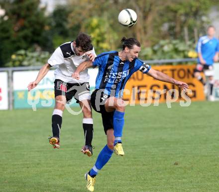 Fussball Kaerntner Liga. Bleiburg gegen Drautal. Danijel Dlopst, (Bleiburg),  Daniel Trupp  (Drautal). Bleiburg, am 28.9.2013.
Foto: Kuess
---
pressefotos, pressefotografie, kuess, qs, qspictures, sport, bild, bilder, bilddatenbank