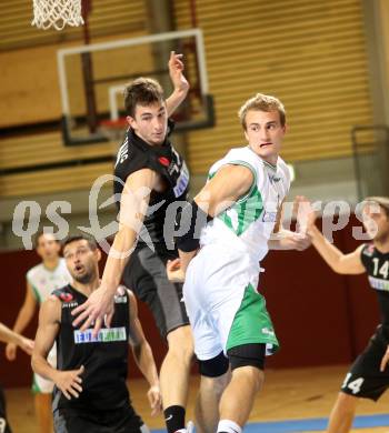 2. Basketball Bundesliga. KOS Posojilnica Bank Celovec gegen BBU Salzburg. Gallob Fabian (KOS), Ratttey Lorenz (Salzburg). Klagenfurt, 28.9.2013.
Foto: Kuess
---
pressefotos, pressefotografie, kuess, qs, qspictures, sport, bild, bilder, bilddatenbank