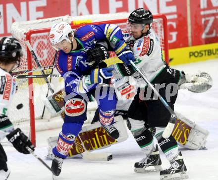 EBEL. Eishockey Bundesliga. EC VSV gegen HDD Telemach Olimpija Ljubljana. Brock McBride, (VSV), Matevz Erman  (Laibach). Villach, am 29.9.2013.
Foto: Kuess 


---
pressefotos, pressefotografie, kuess, qs, qspictures, sport, bild, bilder, bilddatenbank