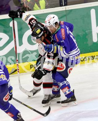 EBEL. Eishockey Bundesliga. EC VSV gegen HC Orli Znojmo. Brock McBride,  (VSV), Jan Seda (Orli Znojmo). Villach, am 6.10..2013.
Foto: Kuess 


---
pressefotos, pressefotografie, kuess, qs, qspictures, sport, bild, bilder, bilddatenbank