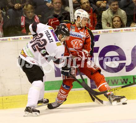 EBEL. Eishockey Bundesliga. KAC gegen SAPA Fehervar AV19. Manuel Geier,  (KAC), Viktor Tokaji (Alba Volan). Klagenfurt, am 8.10.2013
Foto: Kuess 

---
pressefotos, pressefotografie, kuess, qs, qspictures, sport, bild, bilder, bilddatenbank