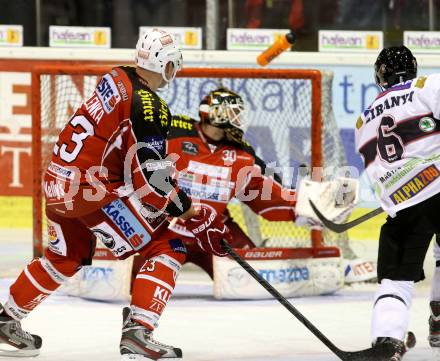 EBEL. Eishockey Bundesliga. KAC gegen SAPA Fehervar AV19. Mike Siklenka, Rene Swette, (KAC), Bence Sziranyi  (Alba Volan). Klagenfurt, am 8.10.2013
Foto: Kuess 

---
pressefotos, pressefotografie, kuess, qs, qspictures, sport, bild, bilder, bilddatenbank