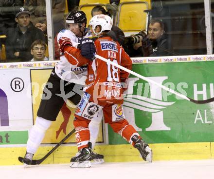 EBEL. Eishockey Bundesliga. KAC gegen SAPA Fehervar AV19. Thomas Koch, (KAC), Andras Benk  (Alba Volan). Klagenfurt, am 8.10.2013
Foto: Kuess 

---
pressefotos, pressefotografie, kuess, qs, qspictures, sport, bild, bilder, bilddatenbank