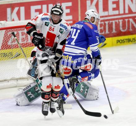 EBEL. Eishockey Bundesliga. EC VSV gegen HC TWK Innsbruck. Markus Peintner,(VSV),  Stefan Pittl  (Innsbruck). Villach, am 8.10..2013.
Foto: Kuess 


---
pressefotos, pressefotografie, kuess, qs, qspictures, sport, bild, bilder, bilddatenbank