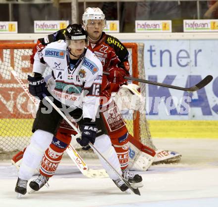 EBEL. Eishockey Bundesliga. KAC gegen SAPA Fehervar AV19. Thomas Poeck,  (KAC),  Andras Benk (Alba Volan). Klagenfurt, am 8.10.2013
Foto: Kuess 

---
pressefotos, pressefotografie, kuess, qs, qspictures, sport, bild, bilder, bilddatenbank