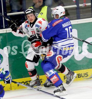 EBEL. Eishockey Bundesliga. EC VSV gegen HC TWK Innsbruck. Daniel Nageler,  (VSV), Luke Salazar (Innsbruck). Villach, am 8.10..2013.
Foto: Kuess 


---
pressefotos, pressefotografie, kuess, qs, qspictures, sport, bild, bilder, bilddatenbank