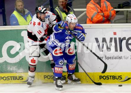 EBEL. Eishockey Bundesliga. EC VSV gegen HC TWK Innsbruck. Gerhard Unterluggauer, (VSV), Patrick Moessmer  (Innsbruck). Villach, am 8.10..2013.
Foto: Kuess 


---
pressefotos, pressefotografie, kuess, qs, qspictures, sport, bild, bilder, bilddatenbank