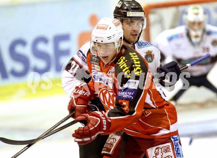 EBEL. Eishockey Bundesliga. KAC gegen SAPA Fehervar AV19. Mihael Filipic,  (KAC), Ladislav Sikorcin (Alba Volan). Klagenfurt, am 8.10.2013
Foto: Kuess 

---
pressefotos, pressefotografie, kuess, qs, qspictures, sport, bild, bilder, bilddatenbank