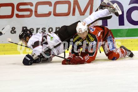 EBEL. Eishockey Bundesliga. KAC gegen SAPA Fehervar AV19. Philipp Kreuzer, (KAC), Tamas Pozsgai  (Alba Volan). Klagenfurt, am 8.10.2013
Foto: Kuess 

---
pressefotos, pressefotografie, kuess, qs, qspictures, sport, bild, bilder, bilddatenbank