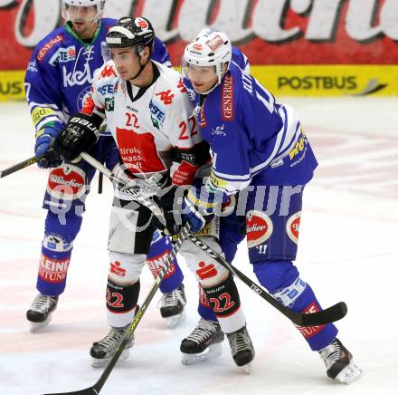 EBEL. Eishockey Bundesliga. EC VSV gegen HC TWK Innsbruck.  Mario Altmann, (VSV), Christoph Hoertnagl (Innsbruck). Villach, am 8.10..2013.
Foto: Kuess 


---
pressefotos, pressefotografie, kuess, qs, qspictures, sport, bild, bilder, bilddatenbank