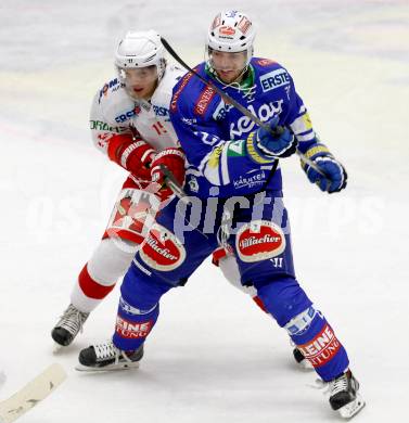 EBEL. Eishockey Bundesliga. EC VSV gegen HCB Suedtirol. Benjamin Petrik,  (VSV), Enrico Miglioranzi (Bozen). Villach, am 11.10..2013.
Foto: Kuess 


---
pressefotos, pressefotografie, kuess, qs, qspictures, sport, bild, bilder, bilddatenbank