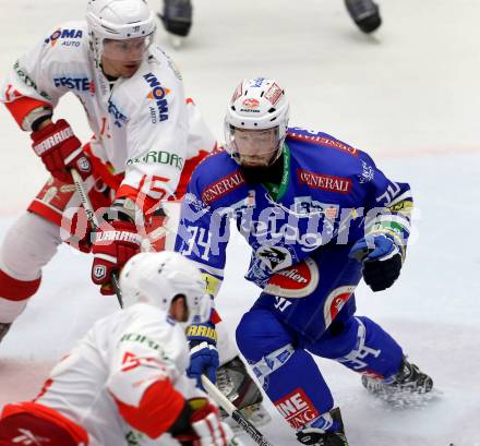 EBEL. Eishockey Bundesliga. EC VSV gegen HCB Suedtirol. Markus Peintner,  (VSV), Enrico Miglioranzi (Bozen). Villach, am 11.10..2013.
Foto: Kuess 


---
pressefotos, pressefotografie, kuess, qs, qspictures, sport, bild, bilder, bilddatenbank