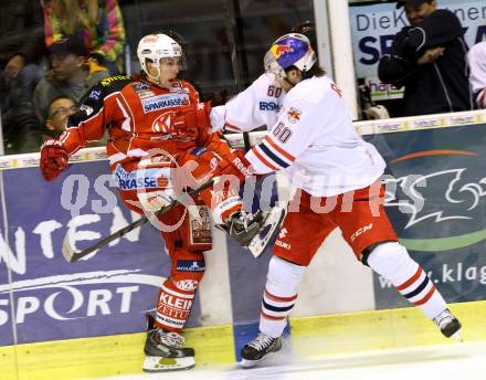 EBEL. Eishockey Bundesliga. KAC gegen EC Red Bull Salzburg. Philipp Kreuzer, (KAC), Troy Milam  (Salzburg). Klagenfurt, am 13.10.2013
Foto: Kuess 

---
pressefotos, pressefotografie, kuess, qs, qspictures, sport, bild, bilder, bilddatenbank