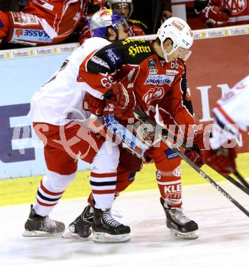 EBEL. Eishockey Bundesliga. KAC gegen EC Red Bull Salzburg. Mihael Filipic,  (KAC), Evan Brophey (Salzburg). Klagenfurt, am 13.10.2013
Foto: Kuess 

---
pressefotos, pressefotografie, kuess, qs, qspictures, sport, bild, bilder, bilddatenbank