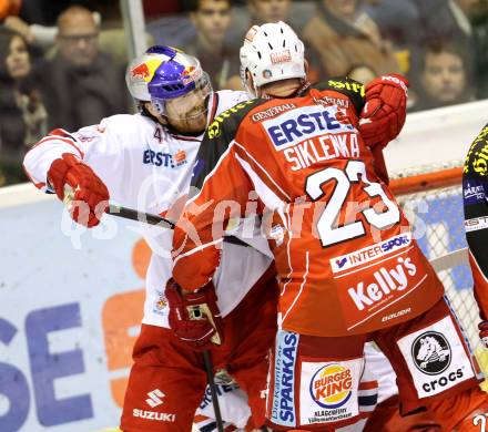 EBEL. Eishockey Bundesliga. KAC gegen EC Red Bull Salzburg. Mike Siklenka,  (KAC), Douglas Lynch (Salzburg). Klagenfurt, am 13.10.2013
Foto: Kuess 

---
pressefotos, pressefotografie, kuess, qs, qspictures, sport, bild, bilder, bilddatenbank