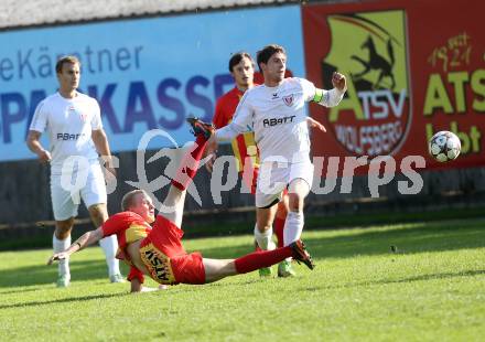 Fussball Kaerntner Liga. ATSV Wolfsberg gegen ATUS Ferlach. Marcel Stoni,  (Wolfsberg), Markus Dixer (Ferlach). Wolfsberg, 13.10.2013.
Foto: Kuess
---
pressefotos, pressefotografie, kuess, qs, qspictures, sport, bild, bilder, bilddatenbank