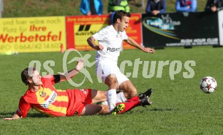 Fussball Kaerntner Liga. ATSV Wolfsberg gegen ATUS Ferlach. Florian Rabensteiner, (Wolfsberg),  Ernst Golautschnig (Ferlach). Wolfsberg, 13.10.2013.
Foto: Kuess
---
pressefotos, pressefotografie, kuess, qs, qspictures, sport, bild, bilder, bilddatenbank
