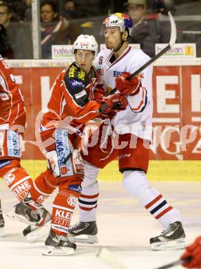 EBEL. Eishockey Bundesliga. KAC gegen EC Red Bull Salzburg. Daniel Ban, (KAC), Thomas Raffl  (Salzburg). Klagenfurt, am 13.10.2013
Foto: Kuess 

---
pressefotos, pressefotografie, kuess, qs, qspictures, sport, bild, bilder, bilddatenbank