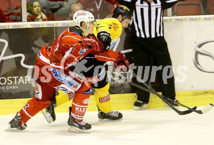 EBEL. Eishockey Bundesliga. KAC gegen UPC Vienna Capitals. Thomas Vallant, (KAC), Jonathan Ferland  (Caps). Klagenfurt, am 15.10.2013
Foto: Kuess 

---
pressefotos, pressefotografie, kuess, qs, qspictures, sport, bild, bilder, bilddatenbank