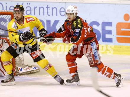 EBEL. Eishockey Bundesliga. KAC gegen UPC Vienna Capitals. Markus Mueller,  (KAC), Rafael Rotter (Caps). Klagenfurt, am 15.10.2013
Foto: Kuess 

---
pressefotos, pressefotografie, kuess, qs, qspictures, sport, bild, bilder, bilddatenbank