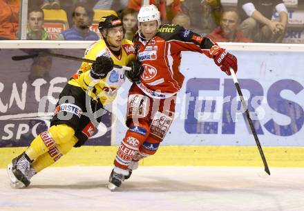 EBEL. Eishockey Bundesliga. KAC gegen UPC Vienna Capitals. Kirk Furey, (KAC), Patrick Peter  (Caps). Klagenfurt, am 15.10.2013
Foto: Kuess 

---
pressefotos, pressefotografie, kuess, qs, qspictures, sport, bild, bilder, bilddatenbank