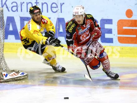 EBEL. Eishockey Bundesliga. KAC gegen Vienna Capitals. Tyler Scofield (KAC), Rafael Rotter (Caps). Klagenfurt, am 15.10.2013.
Foto: Kuess
---
pressefotos, pressefotografie, kuess, qs, qspictures, sport, bild, bilder, bilddatenbank