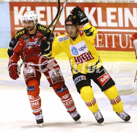 EBEL. Eishockey Bundesliga. KAC gegen Vienna Capitals. Florian Iberer(KAC), Justin Keller (Caps). Klagenfurt, am 15.10.2013.
Foto: Kuess
---
pressefotos, pressefotografie, kuess, qs, qspictures, sport, bild, bilder, bilddatenbank