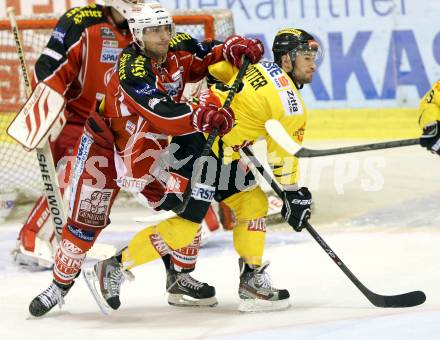 EBEL. Eishockey Bundesliga. KAC gegen UPC Vienna Capitals. Herbert Ratz,  (KAC), Rafael Rotter (Caps). Klagenfurt, am 15.10.2013
Foto: Kuess 

---
pressefotos, pressefotografie, kuess, qs, qspictures, sport, bild, bilder, bilddatenbank