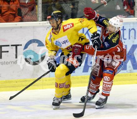 EBEL. Eishockey Bundesliga. KAC gegen UPC Vienna Capitals. Kirk Furey,  (KAC), Philippe Lakos (Caps). Klagenfurt, am 15.10.2013
Foto: Kuess 

---
pressefotos, pressefotografie, kuess, qs, qspictures, sport, bild, bilder, bilddatenbank