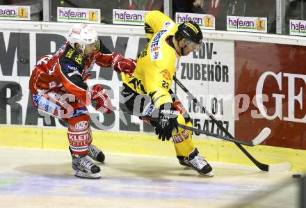 EBEL. Eishockey Bundesliga. KAC gegen Vienna Capitals. Johannes Reichel(KAC), Markus Schlacher (Caps). Klagenfurt, am 15.10.2013.
Foto: Kuess
---
pressefotos, pressefotografie, kuess, qs, qspictures, sport, bild, bilder, bilddatenbank