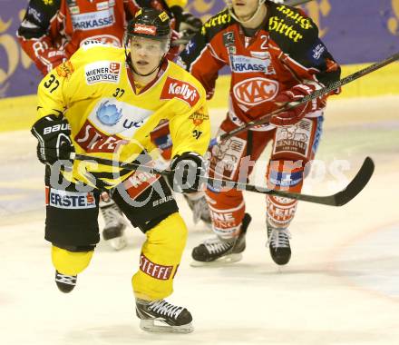 EBEL. Eishockey Bundesliga. KAC gegen UPC Vienna Capitals.  Kevin Puschnik  (Caps). Klagenfurt, am 15.10.2013
Foto: Kuess 

---
pressefotos, pressefotografie, kuess, qs, qspictures, sport, bild, bilder, bilddatenbank