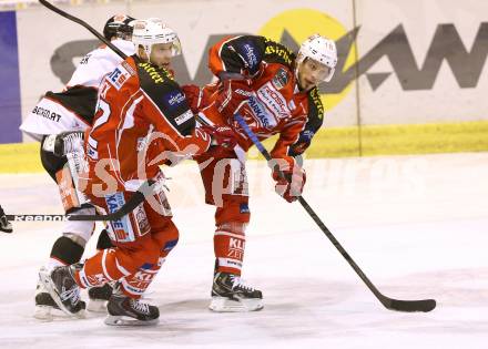 EBEL. Eishockey Bundesliga. KAC gegen HC TWK Innsbruck Die Haie. Thomas Poeck, Thomas Koch (KAC). Klagenfurt, am 18.10.2013.
Foto: Kuess
---
pressefotos, pressefotografie, kuess, qs, qspictures, sport, bild, bilder, bilddatenbank