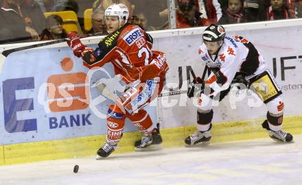 EBEL. Eishockey Bundesliga. KAC gegen HC TWK Innsbruck. Manuel Geier,  (KAC), Herbert Steiner (Innsbruck). Klagenfurt, am 18.10.2013
Foto: Kuess 

---
pressefotos, pressefotografie, kuess, qs, qspictures, sport, bild, bilder, bilddatenbank