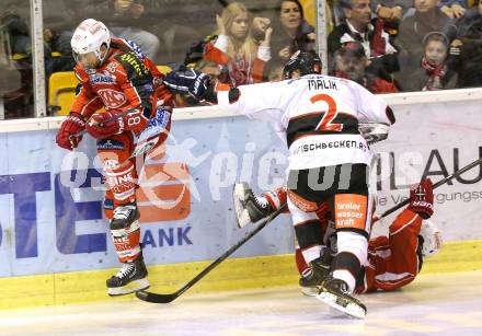 EBEL. Eishockey Bundesliga. KAC gegen HC TWK Innsbruck Die Haie. Floria Iberer (KAC),  Marek Malik (Innsbruck). Klagenfurt, am 18.10.2013.
Foto: Kuess
---
pressefotos, pressefotografie, kuess, qs, qspictures, sport, bild, bilder, bilddatenbank