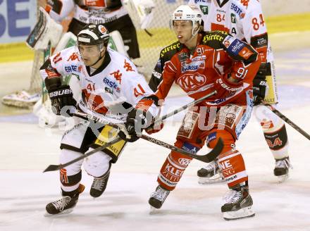 EBEL. Eishockey Bundesliga. KAC gegen HC TWK Innsbruck. Philipp Kreuzer, (KAC), Benedikt Schennach  (Innsbruck). Klagenfurt, am 18.10.2013
Foto: Kuess 

---
pressefotos, pressefotografie, kuess, qs, qspictures, sport, bild, bilder, bilddatenbank