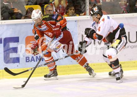 EBEL. Eishockey Bundesliga. KAC gegen HC TWK Innsbruck Die Haie. Jamie Lundmark (KAC), Craig Switzer (Innsbruck). Klagenfurt, am 18.10.2013.
Foto: Kuess
---
pressefotos, pressefotografie, kuess, qs, qspictures, sport, bild, bilder, bilddatenbank