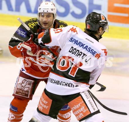 EBEL. Eishockey Bundesliga. KAC gegen HC TWK Innsbruck Die Haie. Tyler Spurgeon (KAC), Justin Donati (Innsbruck). Klagenfurt, am 18.10.2013.
Foto: Kuess
---
pressefotos, pressefotografie, kuess, qs, qspictures, sport, bild, bilder, bilddatenbank