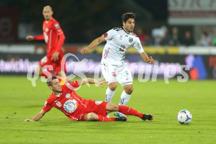 Fussball Bundesliga. RZ Pellets WAC gegen SC Wiener Neustadt. Michele Polverino (WAC), Herbert Rauter (Wiener Neustadt). Wolfsberg, am 19.10.2013.
Foto: Kuess
---
pressefotos, pressefotografie, kuess, qs, qspictures, sport, bild, bilder, bilddatenbank