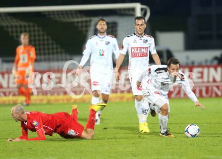 Fussball Bundesliga. RZ Pellets WAC gegen SC Wiener Neustadt. Dario Baldauf (WAC), Dennis Mimm (Wiener Neustadt). Wolfsberg, am 19.10.2013.
Foto: Kuess
---
pressefotos, pressefotografie, kuess, qs, qspictures, sport, bild, bilder, bilddatenbank