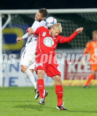 Fussball Bundesliga. RZ Pellets WAC gegen SC Wiener Neustadt. Boris Huettenbrenner (WAC), David Witteveen (Wiener Neustadt). Wolfsberg, am 19.10.2013.
Foto: Kuess
---
pressefotos, pressefotografie, kuess, qs, qspictures, sport, bild, bilder, bilddatenbank