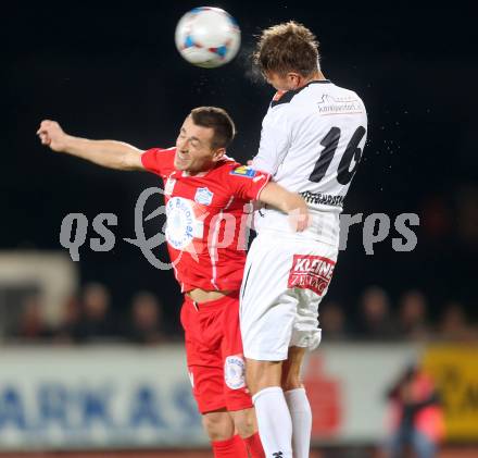 Fussball Bundesliga. RZ Pellets WAC gegen SC Wiener Neustadt. Boris Huettenbrenner (WAC), Herbert Rauter (Wiener Neustadt). Wolfsberg, am 19.10.2013.
Foto: Kuess
---
pressefotos, pressefotografie, kuess, qs, qspictures, sport, bild, bilder, bilddatenbank