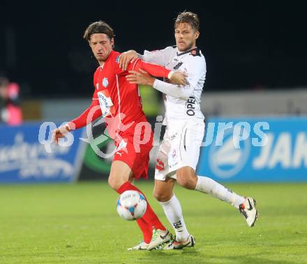 Fussball Bundesliga. RZ Pellets WAC gegen SC Wiener Neustadt. Boris Huettenbrenner (WAC), Thomas Pichlmann (Wiener Neustadt). Wolfsberg, am 19.10.2013.
Foto: Kuess
---
pressefotos, pressefotografie, kuess, qs, qspictures, sport, bild, bilder, bilddatenbank