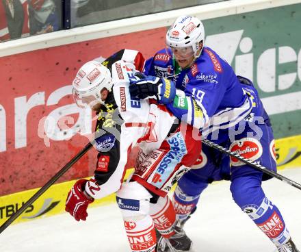 EBEL. Eishockey Bundesliga. EC VSV gegen KAC. Stefan Bacher, (VSV), Thomas Poeck  (KAC). Villach, am 22.10..2013.
Foto: Kuess 


---
pressefotos, pressefotografie, kuess, qs, qspictures, sport, bild, bilder, bilddatenbank