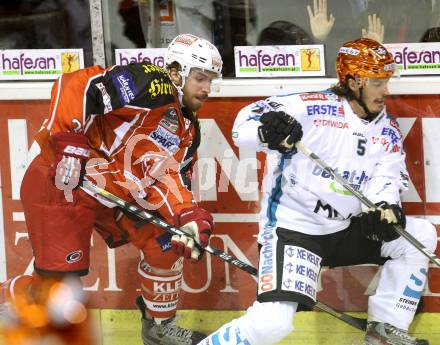 EBEL. Eishockey Bundesliga. KAC gegen EHC LIWEST Linz. Andreas Noedl, (KAC), Jason Ulmer  (Linz). Klagenfurt, am 25.10.2013
Foto: Kuess 

---
pressefotos, pressefotografie, kuess, qs, qspictures, sport, bild, bilder, bilddatenbank