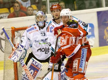 EBEL. Eishockey Bundesliga. KAC gegen EHC LIWEST Linz. Colton Fretter, (KAC), Mathias Mueller  (Linz). Klagenfurt, am 25.10.2013
Foto: Kuess 

---
pressefotos, pressefotografie, kuess, qs, qspictures, sport, bild, bilder, bilddatenbank