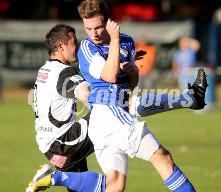 Fussball. Kaerntner Liga. Treibach gegen Spittal/Drau. Werner Buchhaeusl (Treibach), Juergen Gerhard Pichorner (Spittal). Treibach, 26.10.2013.
Foto: Kuess
---
pressefotos, pressefotografie, kuess, qs, qspictures, sport, bild, bilder, bilddatenbank