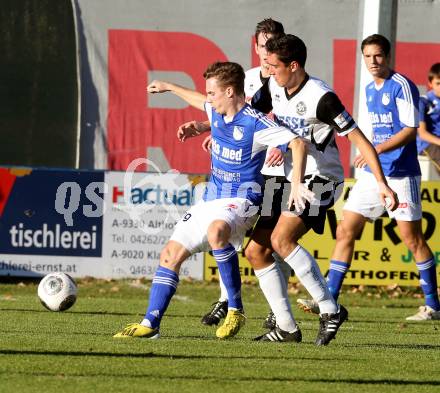 Fussball. Kaerntner Liga. Treibach gegen Spittal/Drau. Werner Buchhaeusl (Treibach), Rafael Graf (Spittal). Treibach, 26.10.2013.
Foto: Kuess
---
pressefotos, pressefotografie, kuess, qs, qspictures, sport, bild, bilder, bilddatenbank