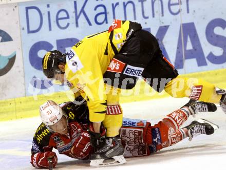 EBEL. Eishockey Bundesliga. KAC gegen UPC Vienna Capitals. Tyler Scofield, (KAC), Patrick Peter  (Caps). . Klagenfurt, am 27.10.2013
Foto: Kuess 

---
pressefotos, pressefotografie, kuess, qs, qspictures, sport, bild, bilder, bilddatenbank